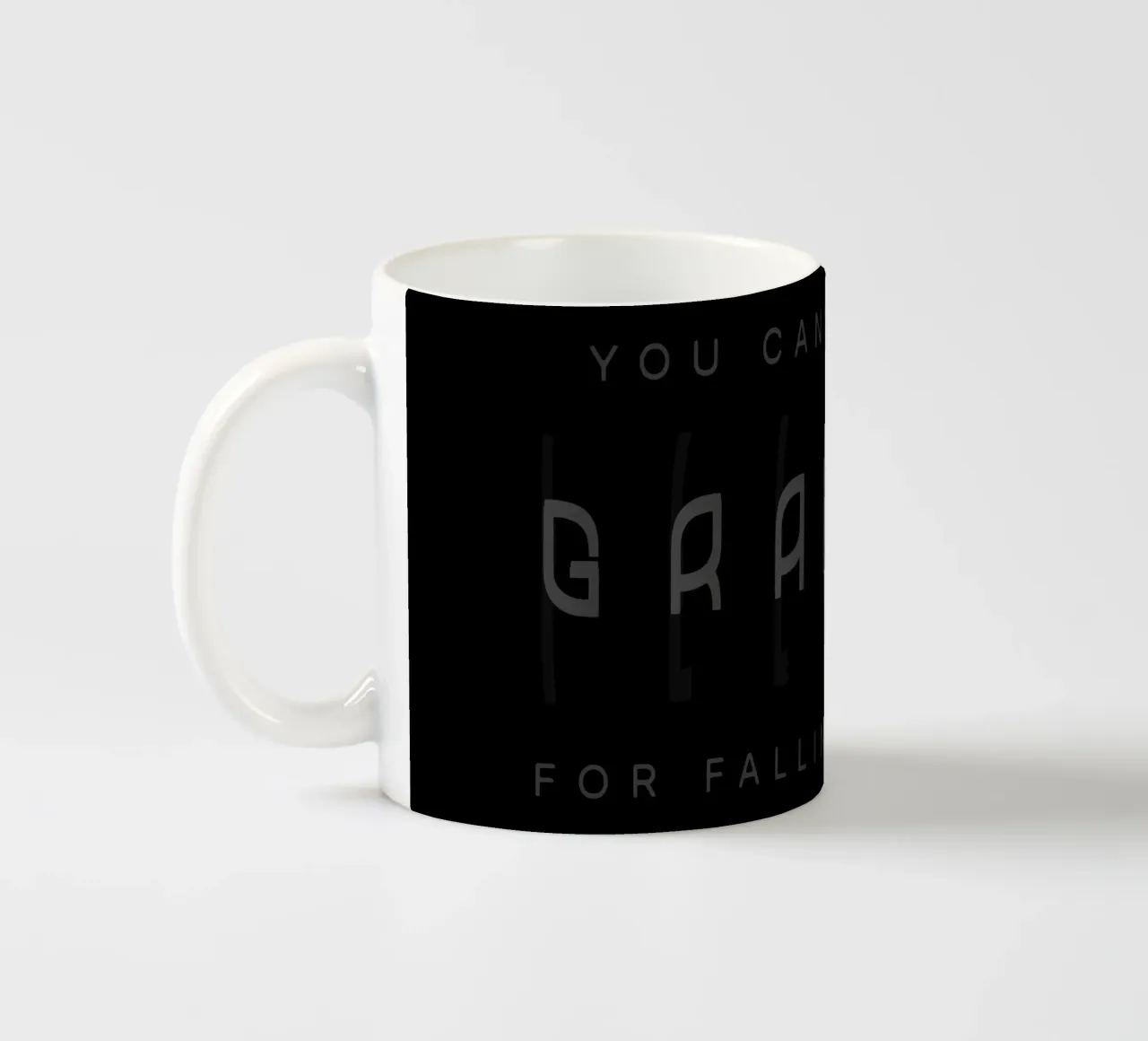 Gravity ceramic mug by Gunawan Rb