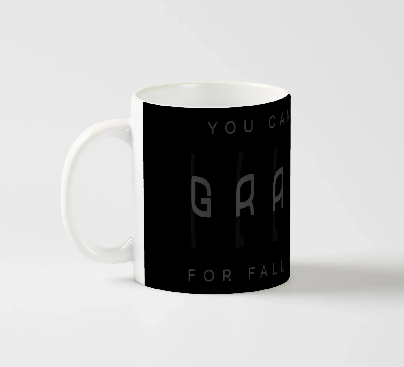 Gravity ceramic mug by Gunawan Rb