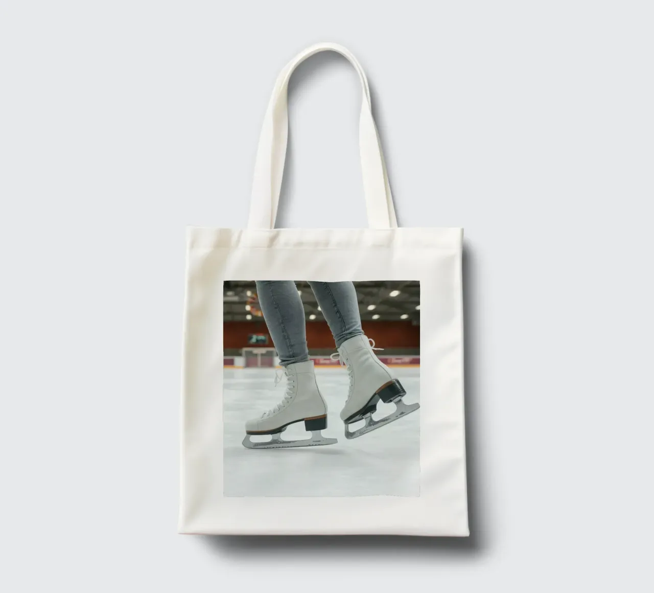 Skater glides effortlessly across the ice at a local rink tote bag by DesignDoodle