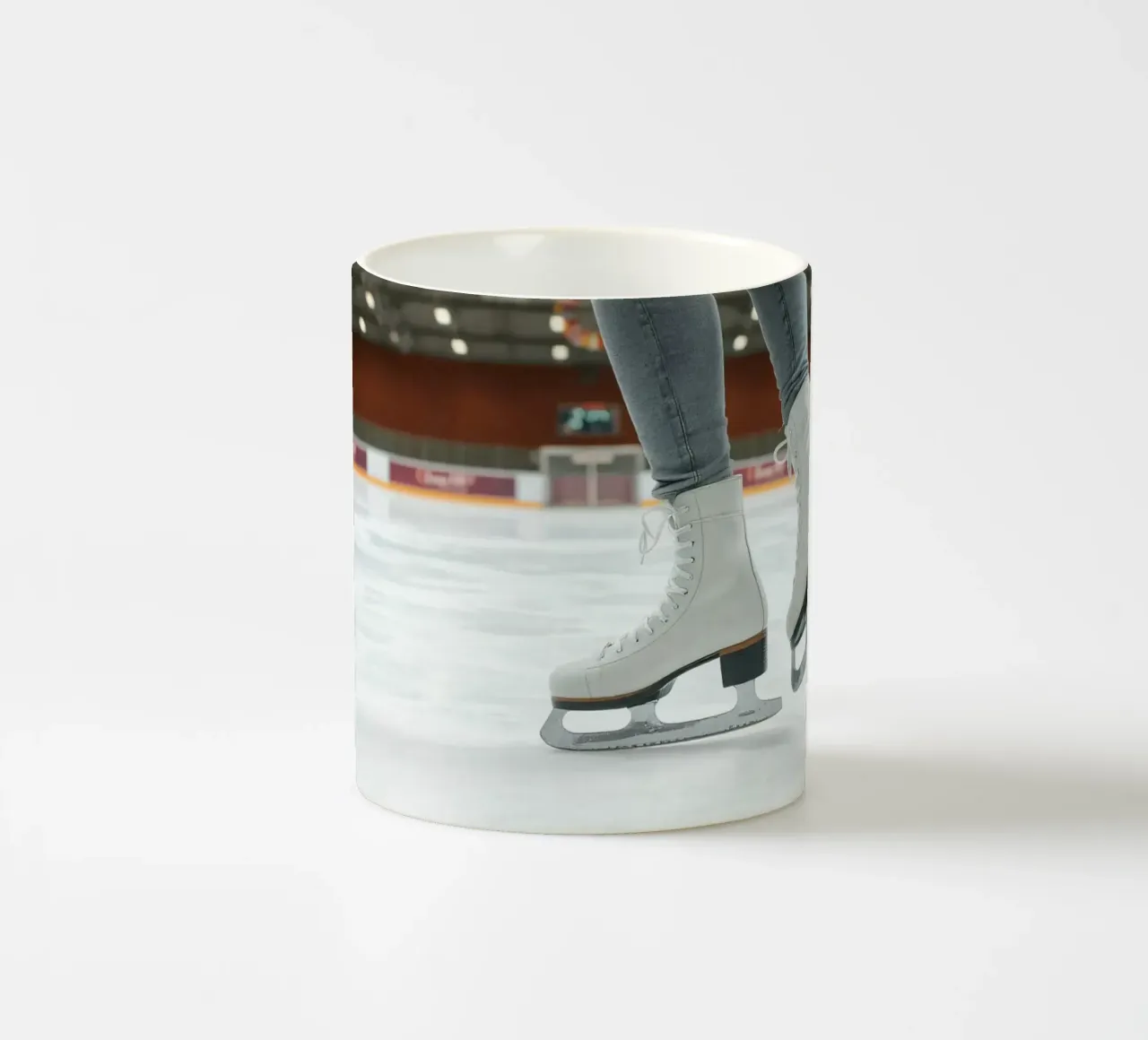 Skater glides effortlessly across the ice at a local rink ceramic mug by DesignDoodle