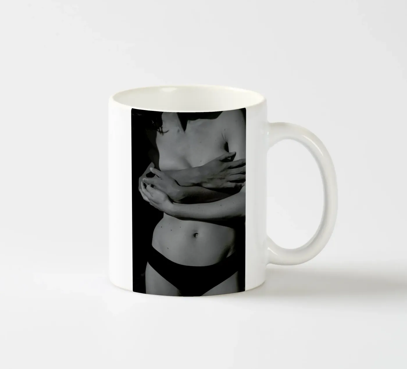Holding ceramic mug by Chris Abatzis