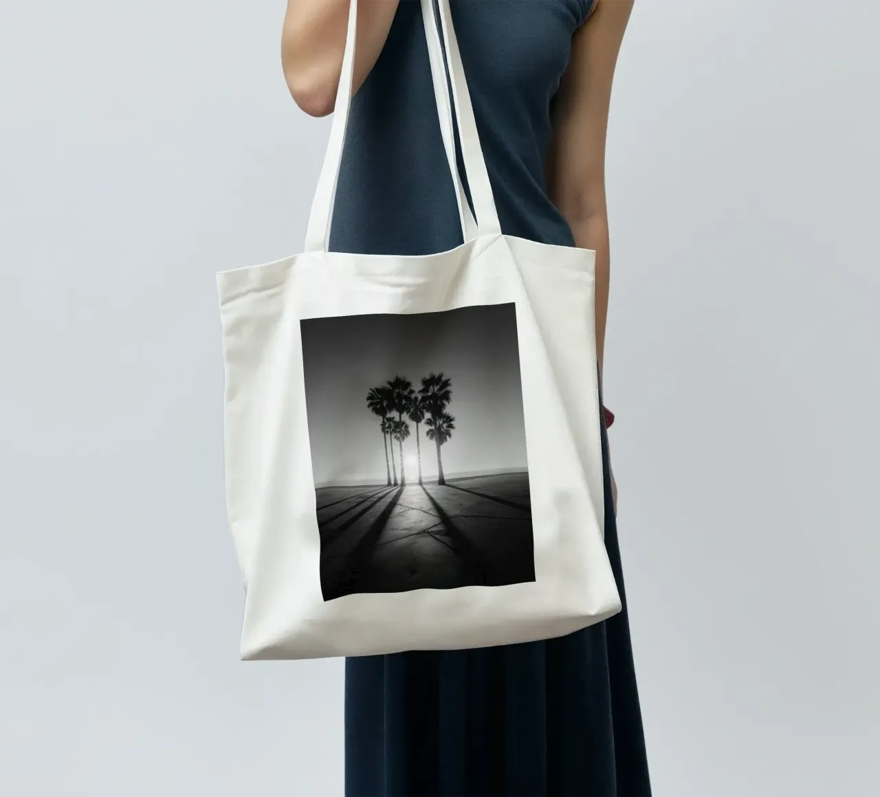 Black and White Sunset Palm Trees on Beach tote bag by Indigo Tides Art