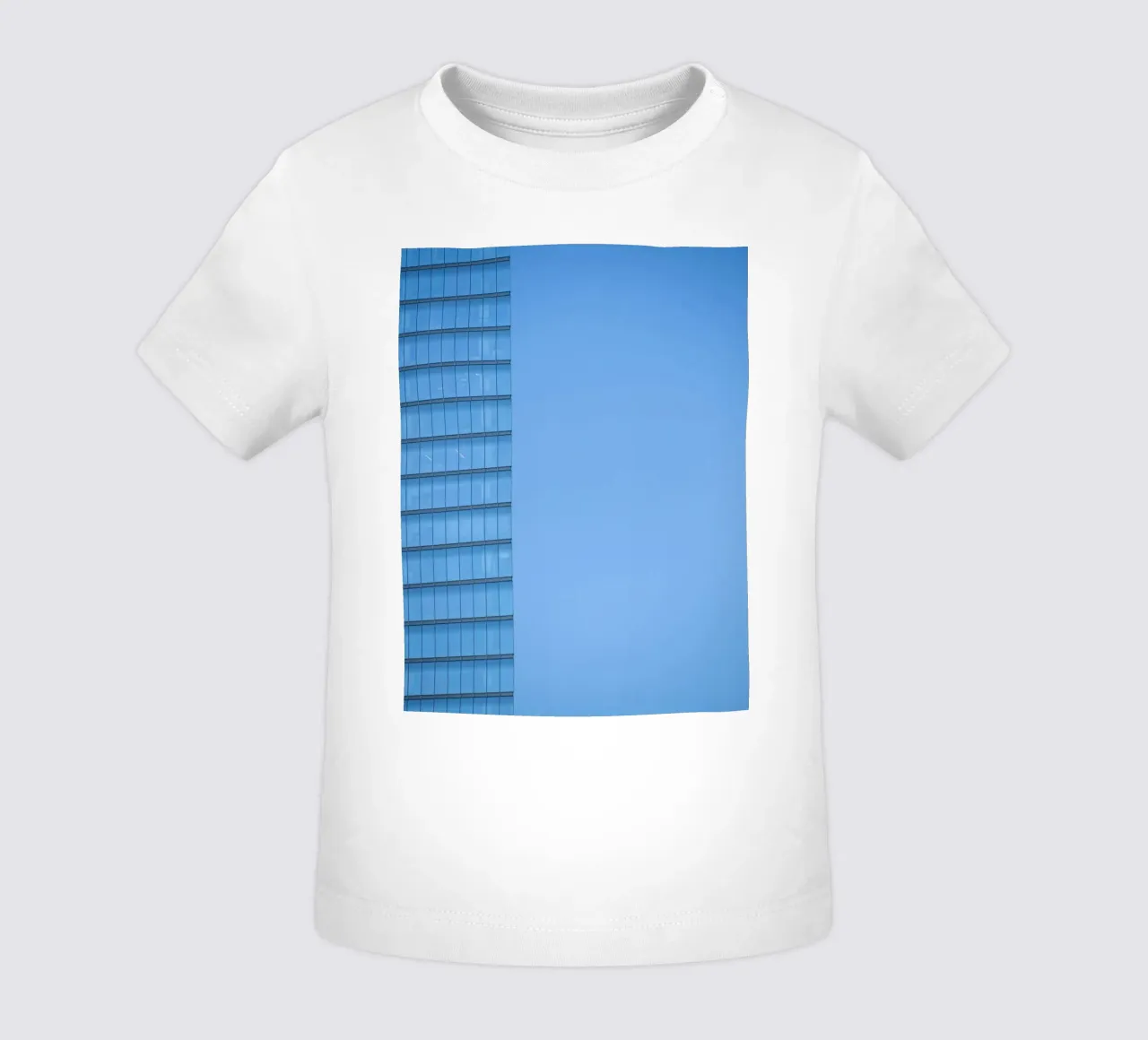 skyline building baby t-shirt by Bleu