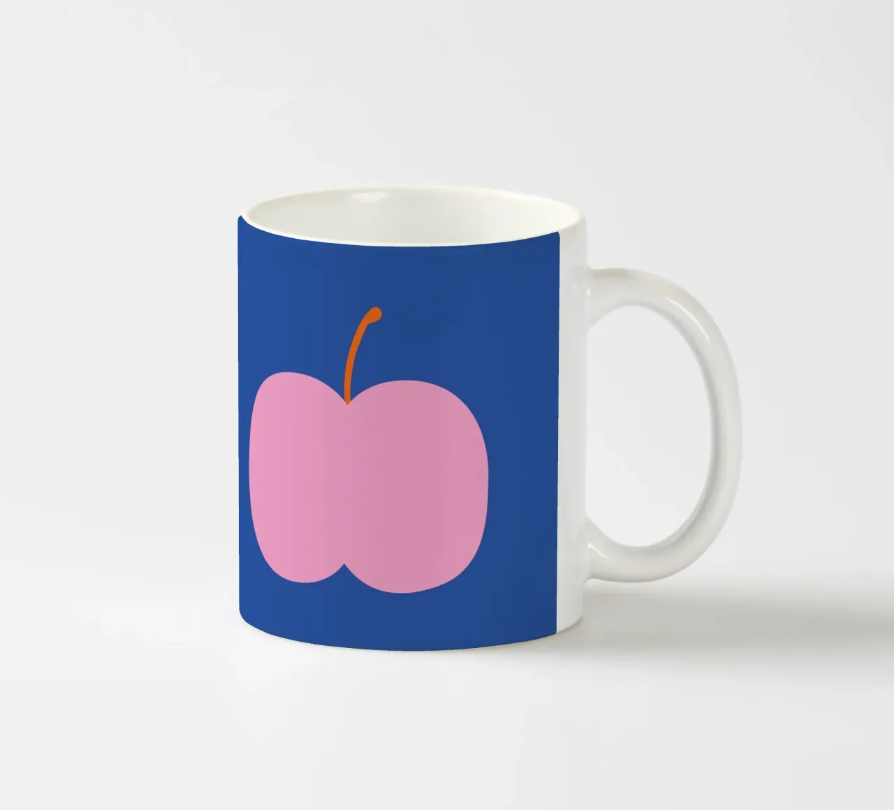 Big pink apple tazza in ceramica da Susann Stefanizen