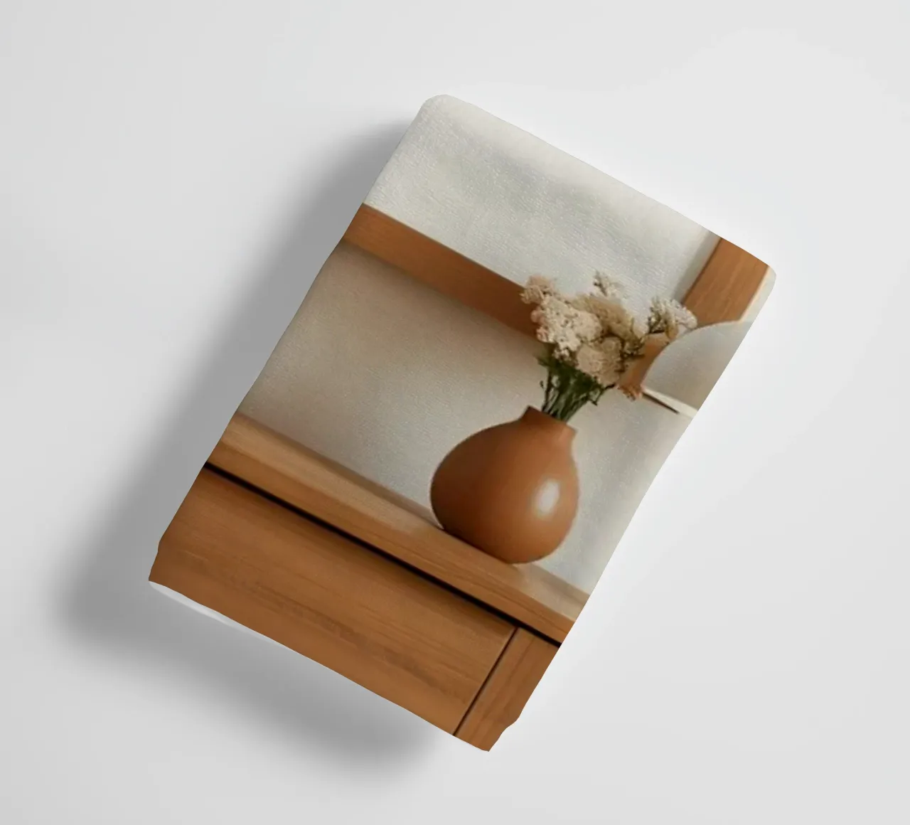 Modern interior featuring a blank frame and minimal decor towel by DesignDoodle
