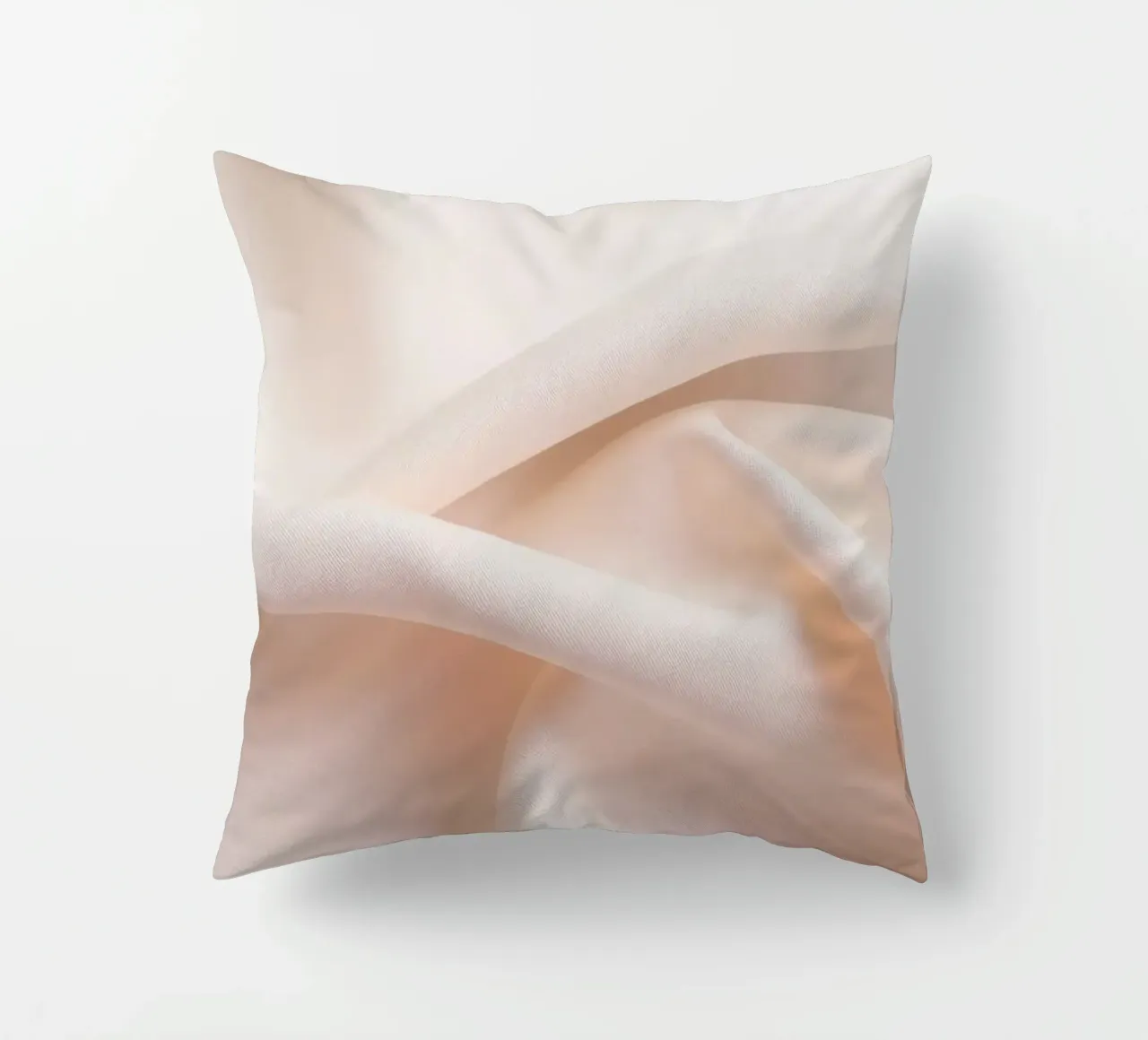 Soft beige fabric draped and folded on a surface decorative cushion by DesignDoodle
