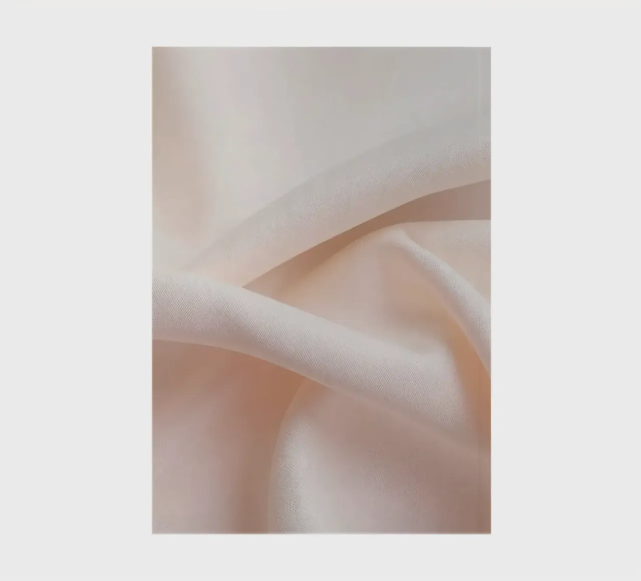 Soft beige fabric draped and folded on a surface notebook by DesignDoodle