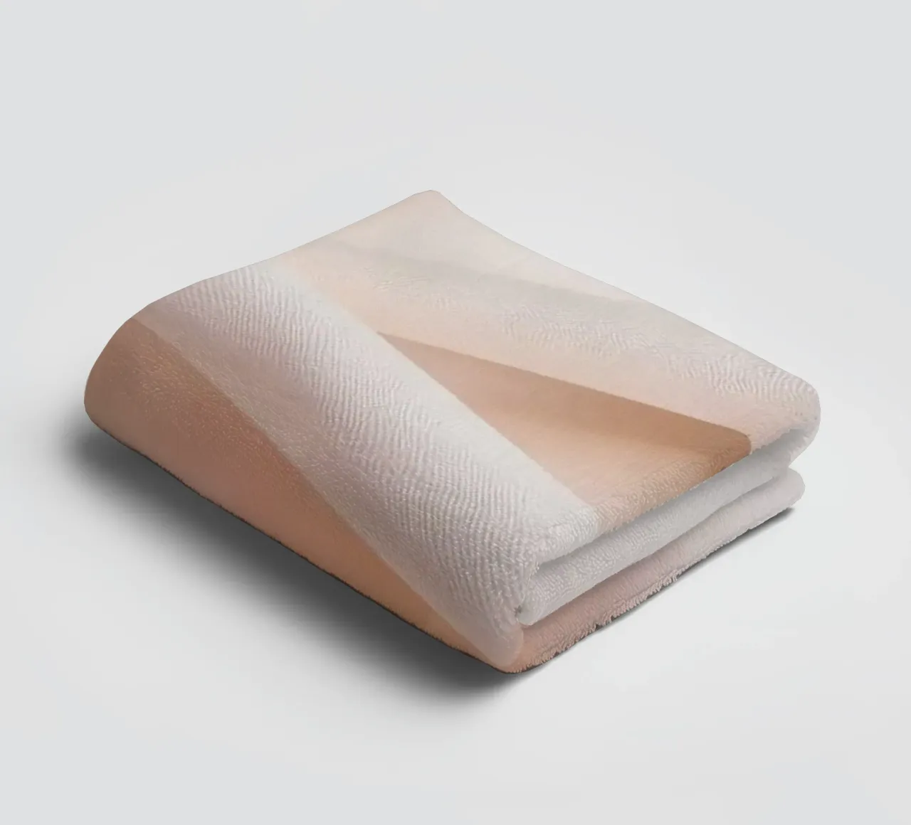 Soft beige fabric draped and folded on a surface towel by DesignDoodle