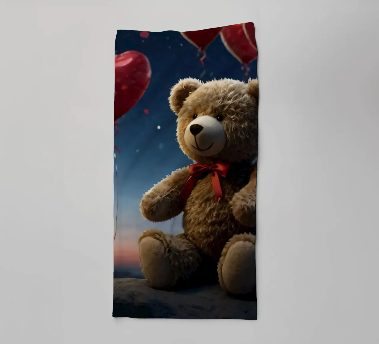 Ourson entouré de ballons en forme de cœur sous un ciel étoilé. serviette de bain de DesignDoodle