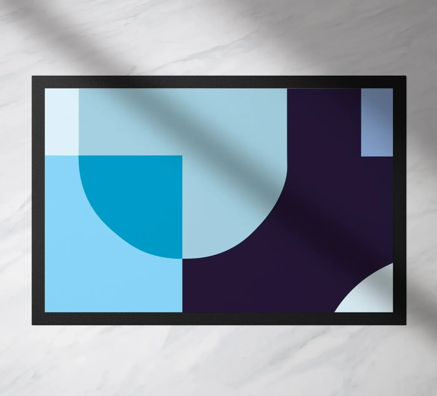 Geometric composition in blue doormat by Studio Vibe