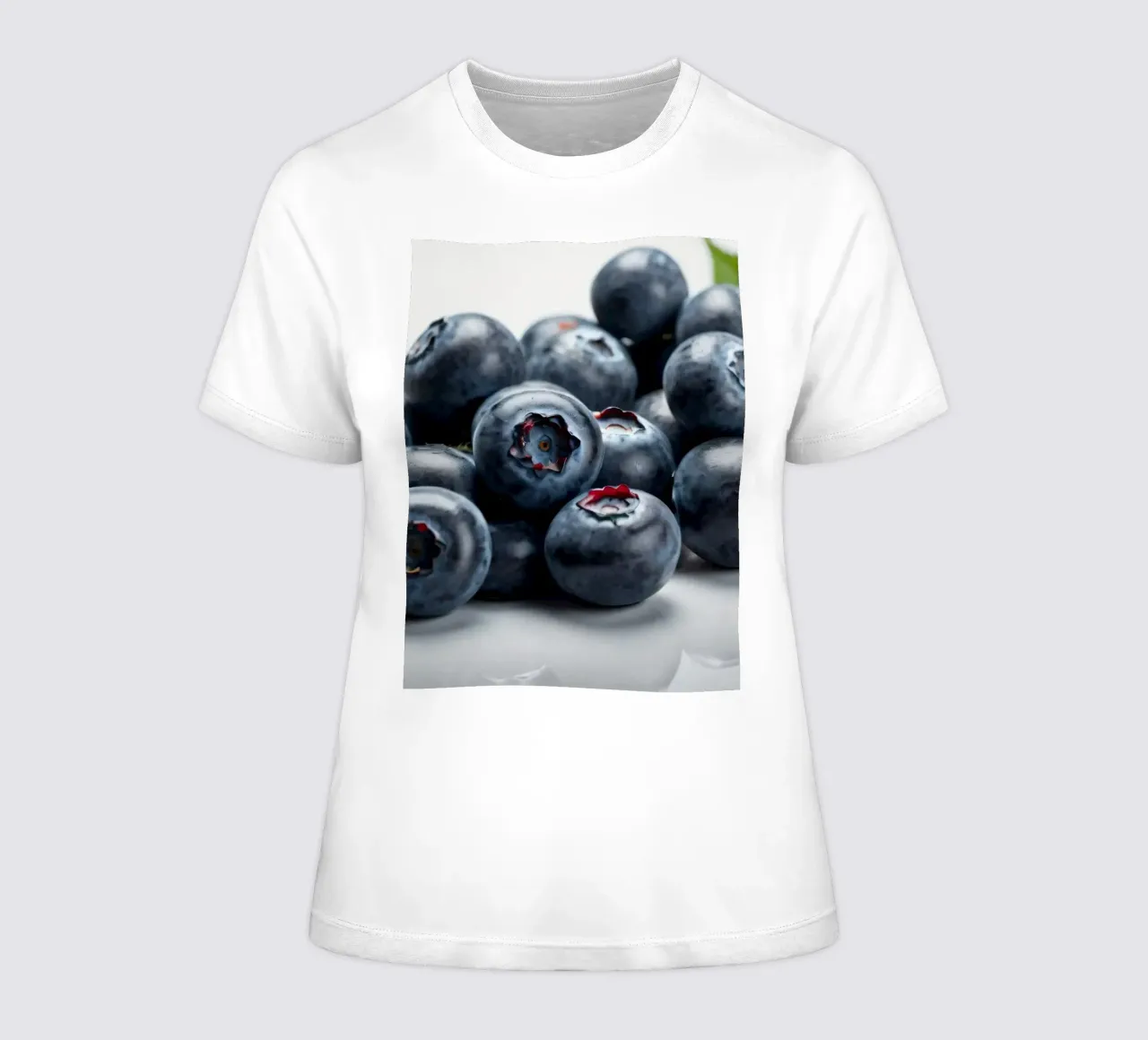 Fresh blueberries arranged neatly on a reflective surface women's fitted t-shirt by DesignDoodle