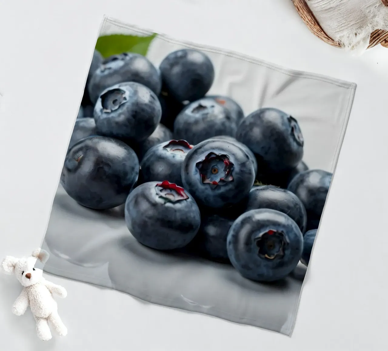 Fresh blueberries arranged neatly on a reflective surface fleece blanket by DesignDoodle