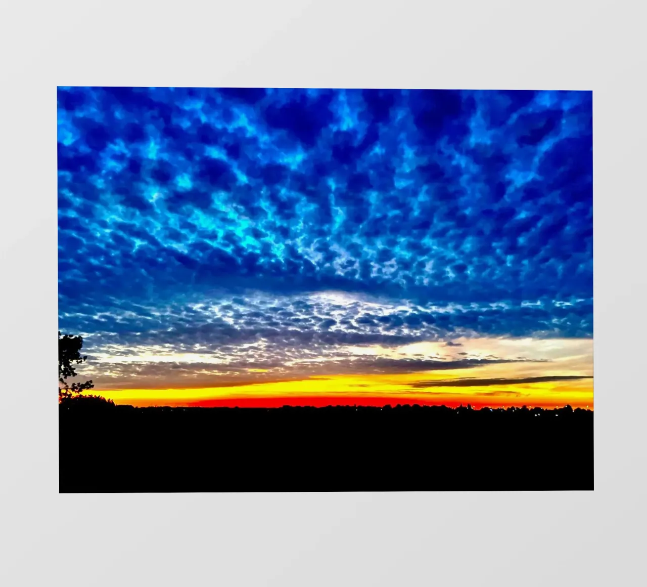 Tramonto con nuvole blu scuro telo in pvc da RealLifeMoments