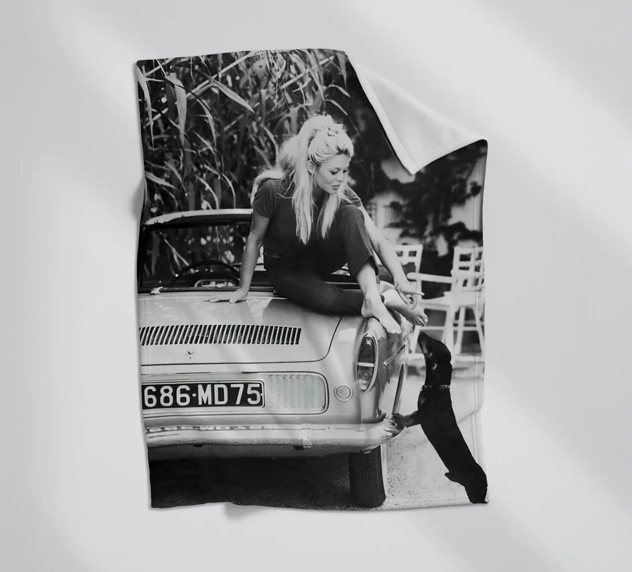 Brigitte Bardot with Dachshund 1962 fleece blanket by hite Shop