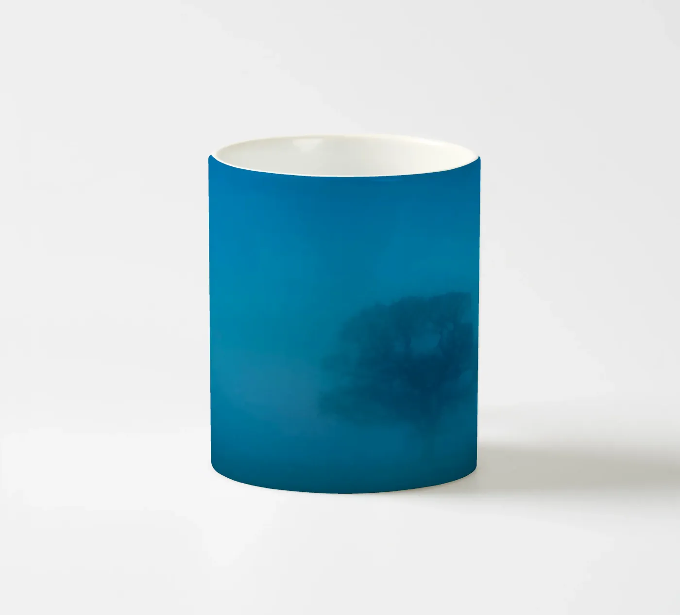 mist tree ceramic mug by Bleu