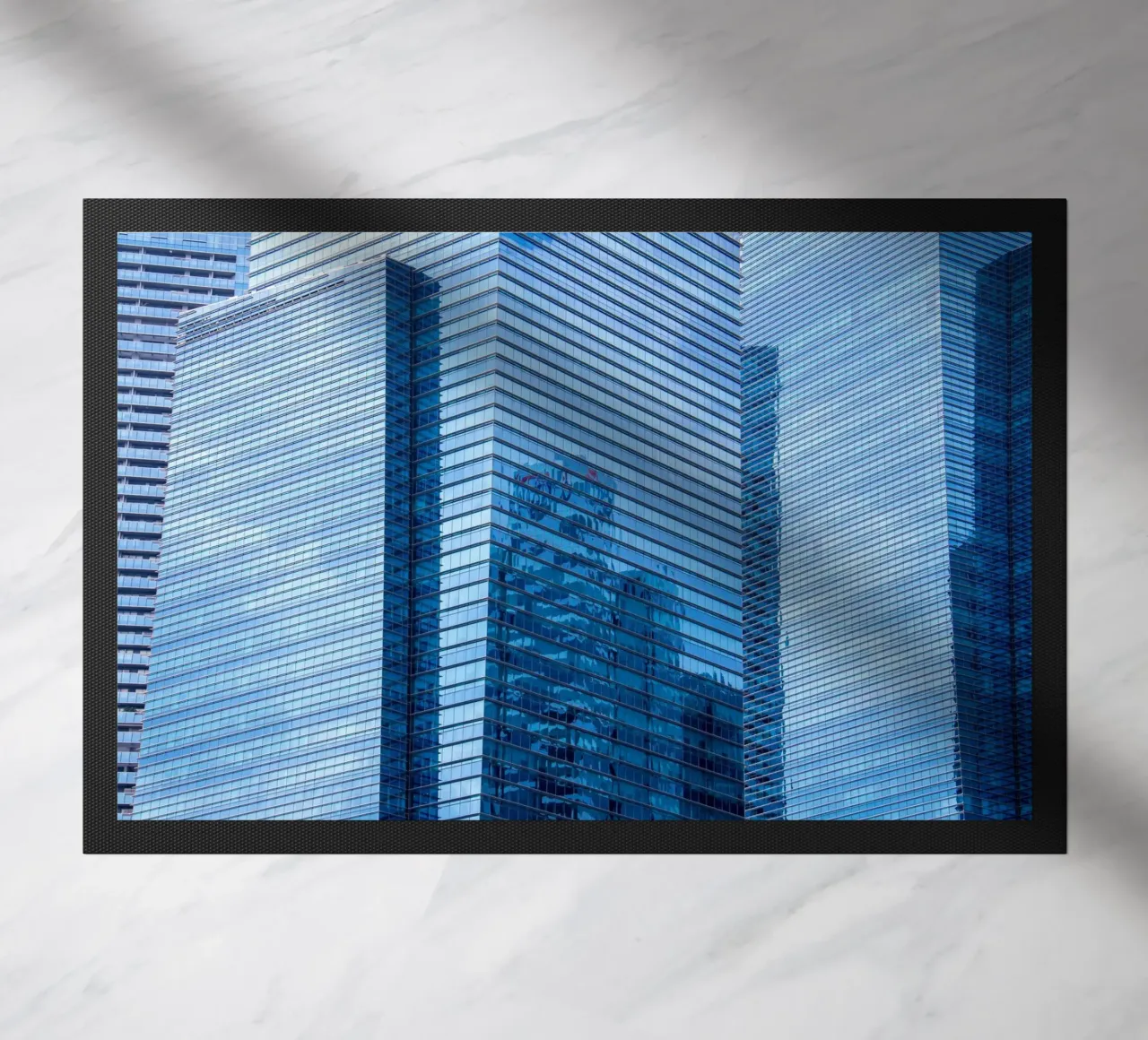 skyscraper grass doormat by Bleu