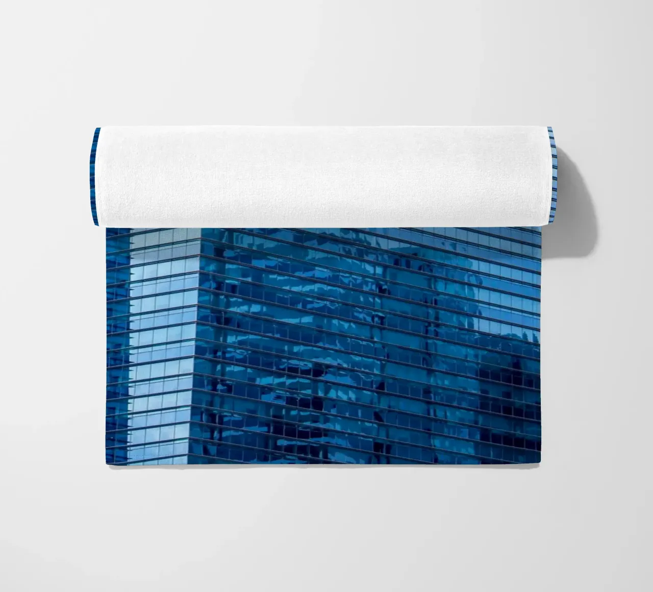 skyscraper grass beach towel by Bleu