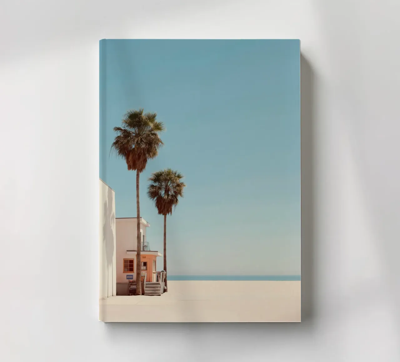 Minimalist Beach Scene with Palm Trees notebook by Indigo Tides Art
