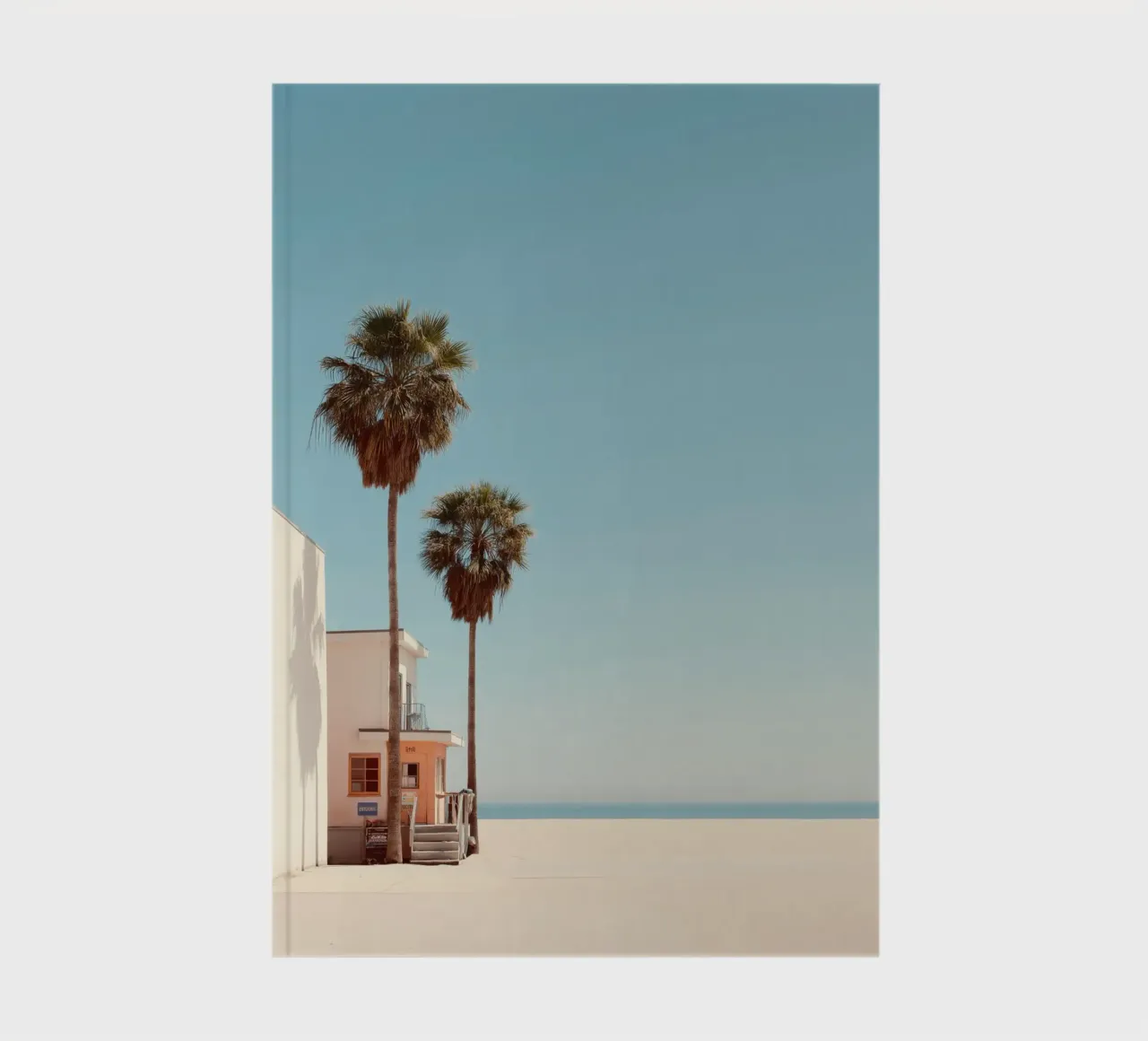 Minimalist Beach Scene with Palm Trees notebook by Indigo Tides Art