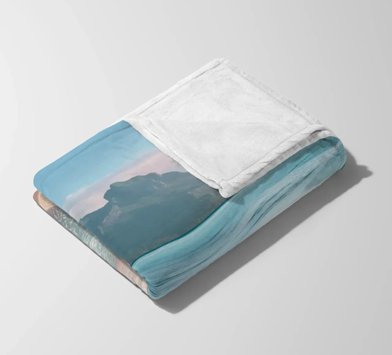 Sand Beach with Mountain Backdrop fleece blanket by Indigo Tides Art
