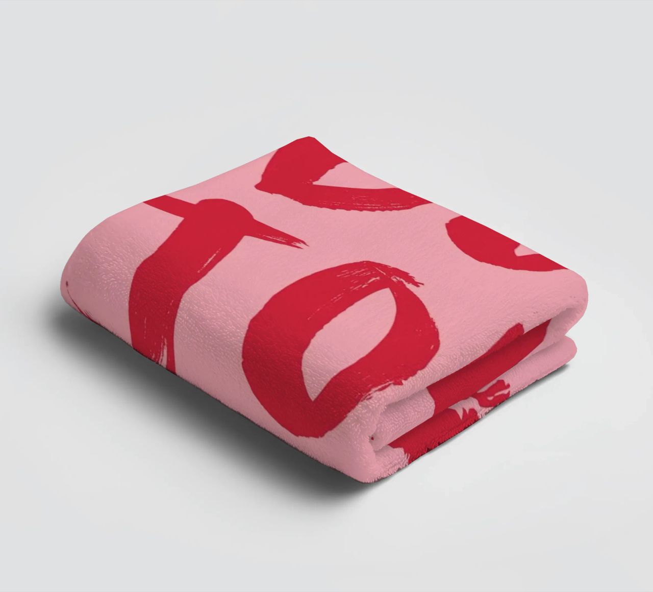 Testo "Bonjour" rosso in grassetto con stampa a labbro su sfondo rosa asciugamano da bagno da pdigitalprints