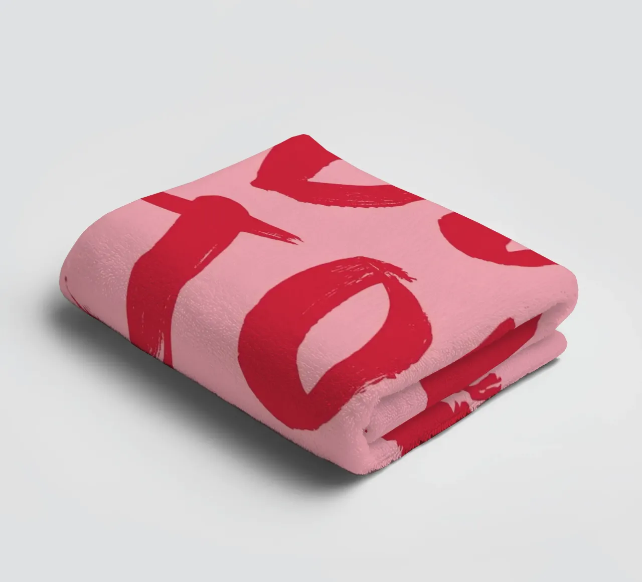 Testo "Bonjour" rosso in grassetto con stampa a labbro su sfondo rosa asciugamano da bagno da pdigitalprints