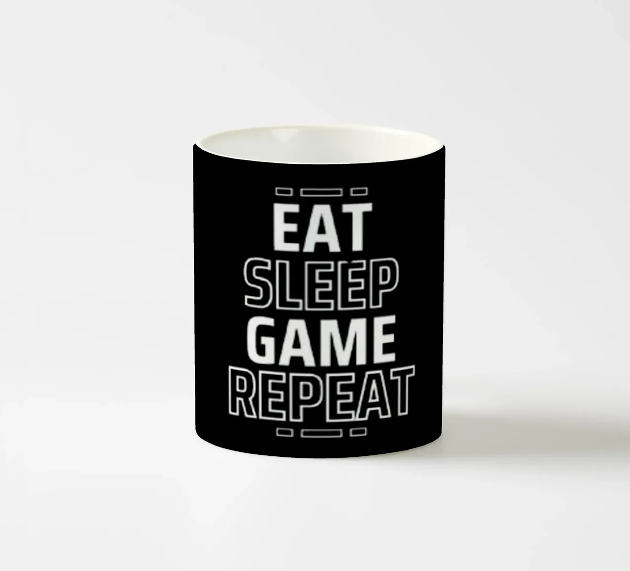 Eat Sleep Game Repeat ceramic mug by Olivia Creator