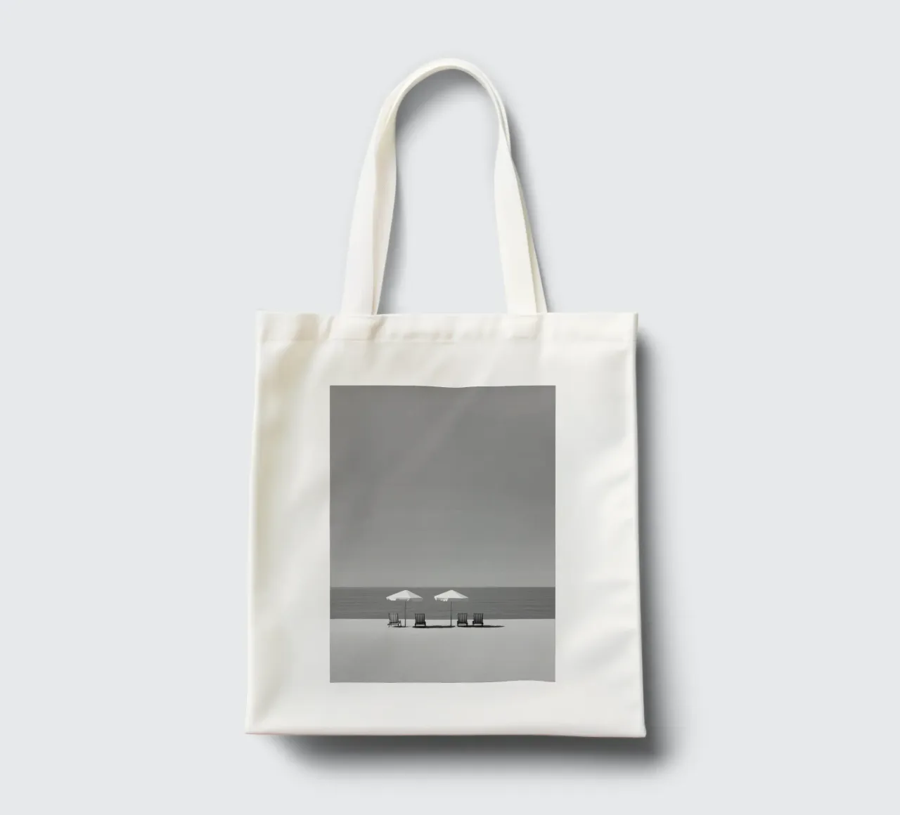 Minimalist Beach Chairs and Umbrellas tote bag by Indigo Tides Art