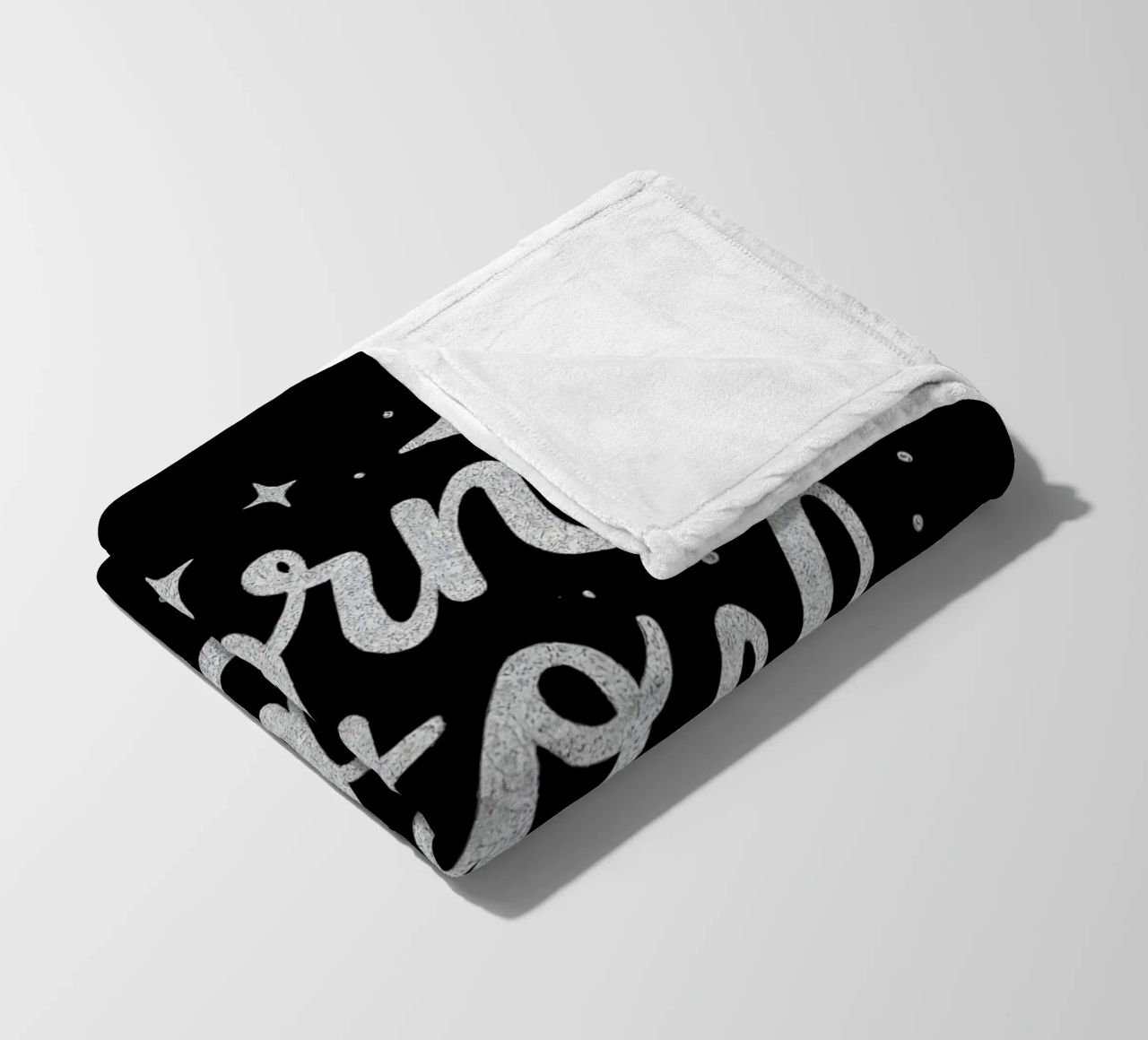 Messaggio "Born to sparkle" (nato per brillare) in lettere d'argento lucido coperta in pile da DesignDoodle