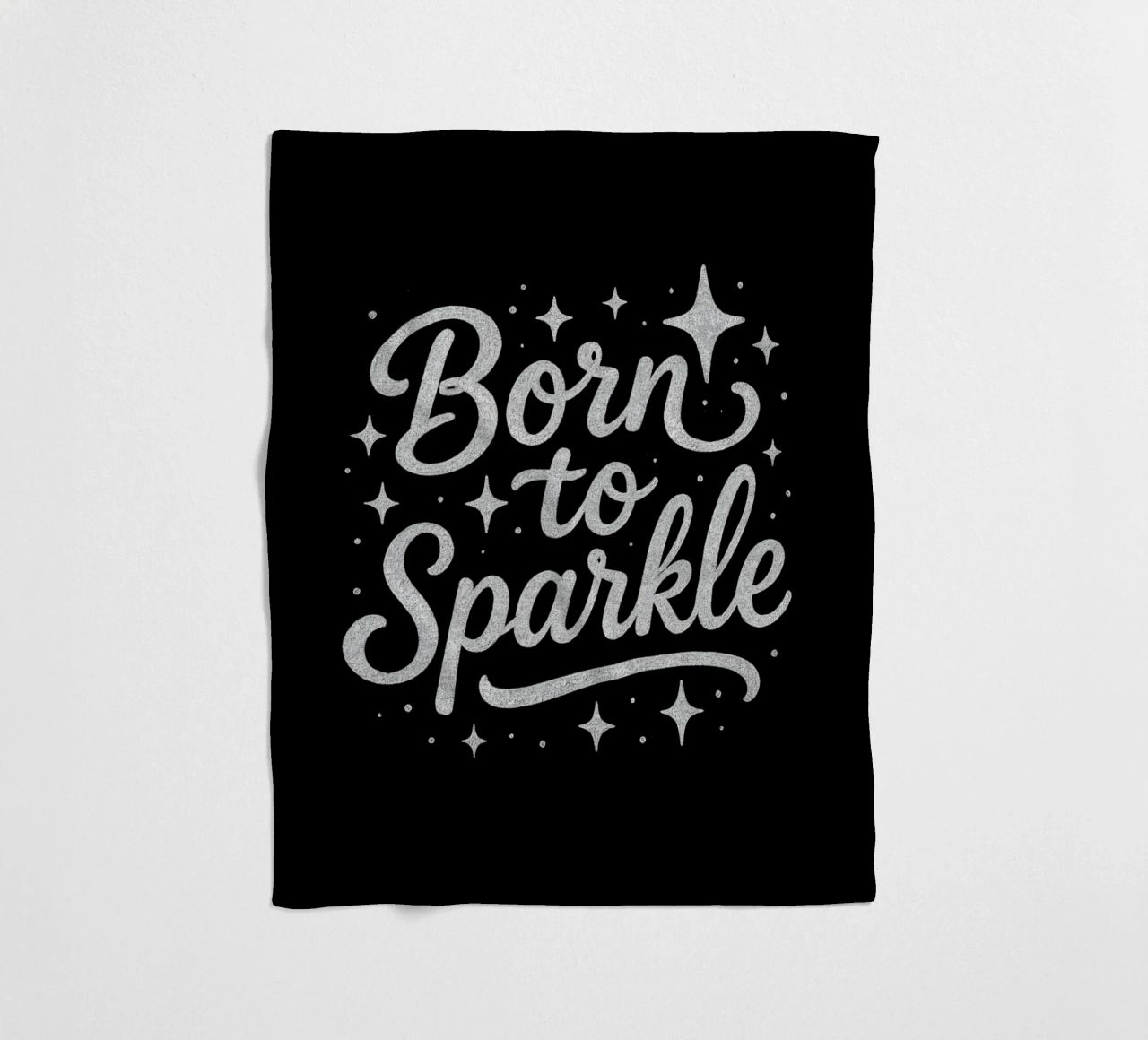 Messaggio "Born to sparkle" (nato per brillare) in lettere d'argento lucido coperta in pile da DesignDoodle