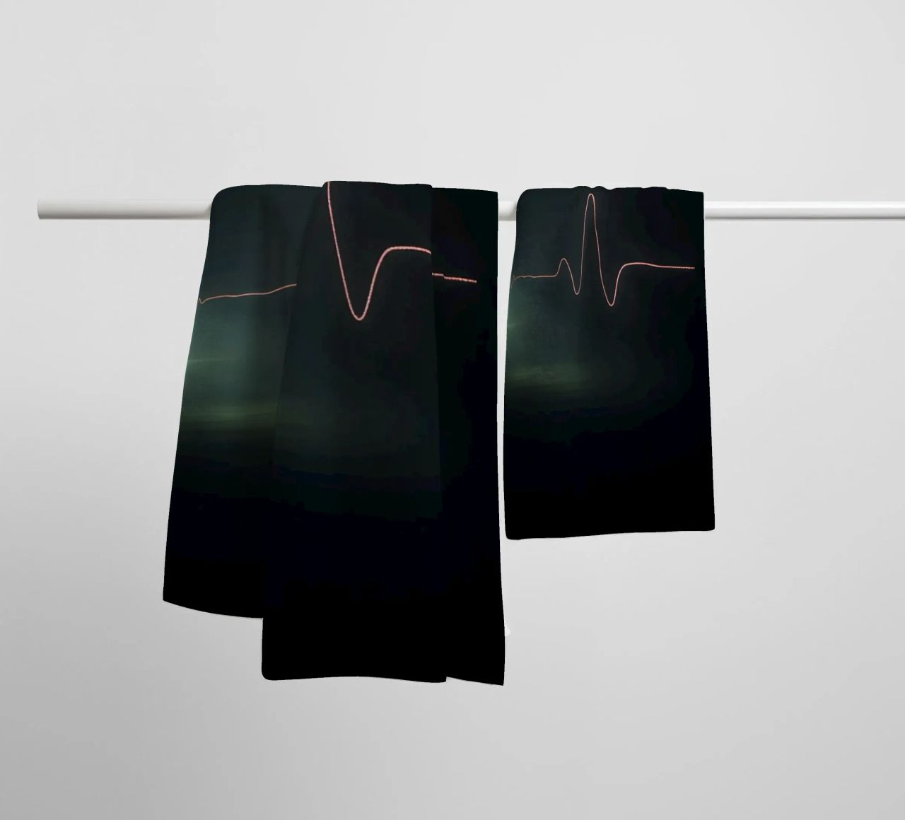 Light trails create a pulse waveform effect in a dark atmos towel by DesignDoodle