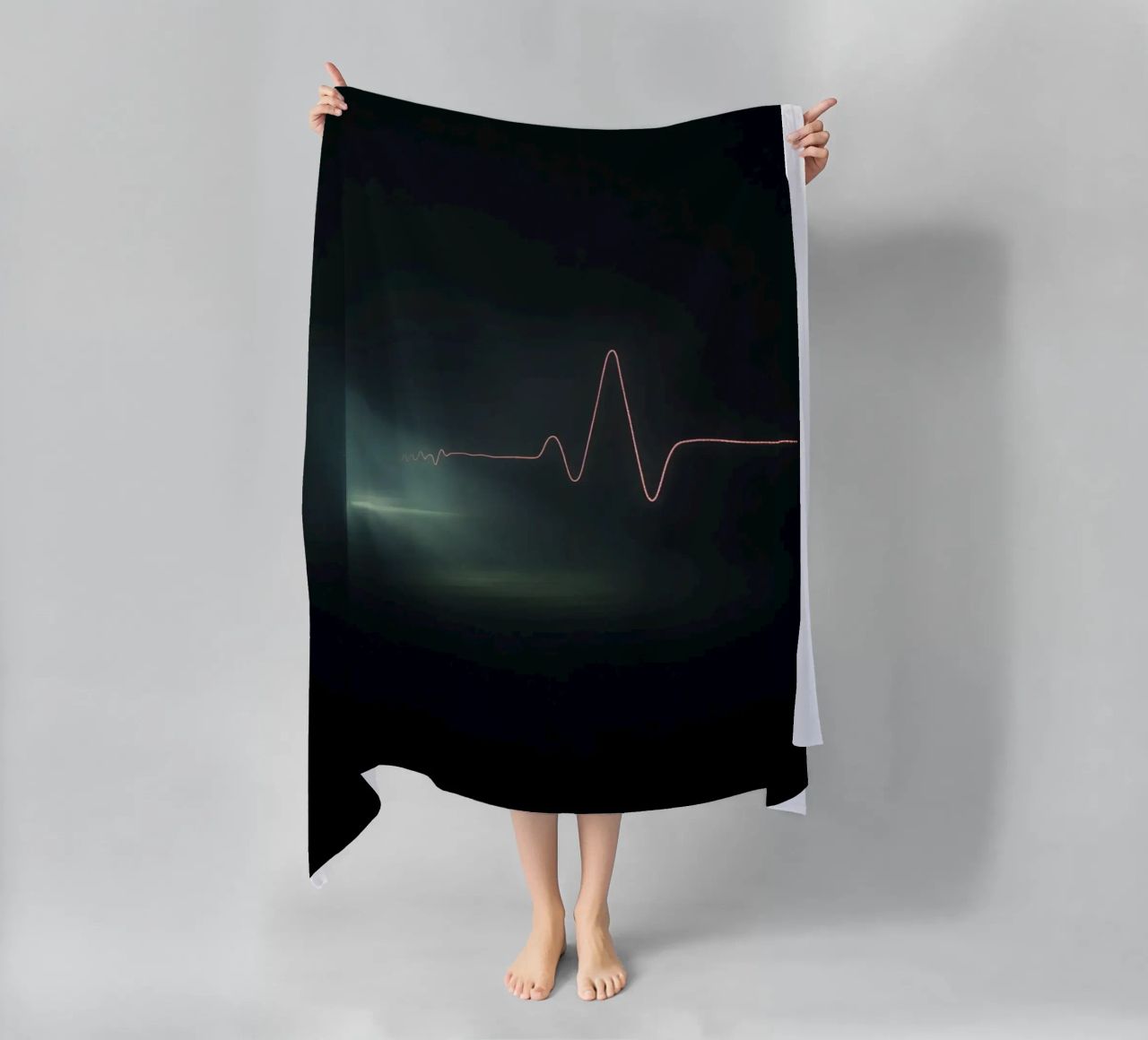 Light trails create a pulse waveform effect in a dark atmos beach towel by DesignDoodle