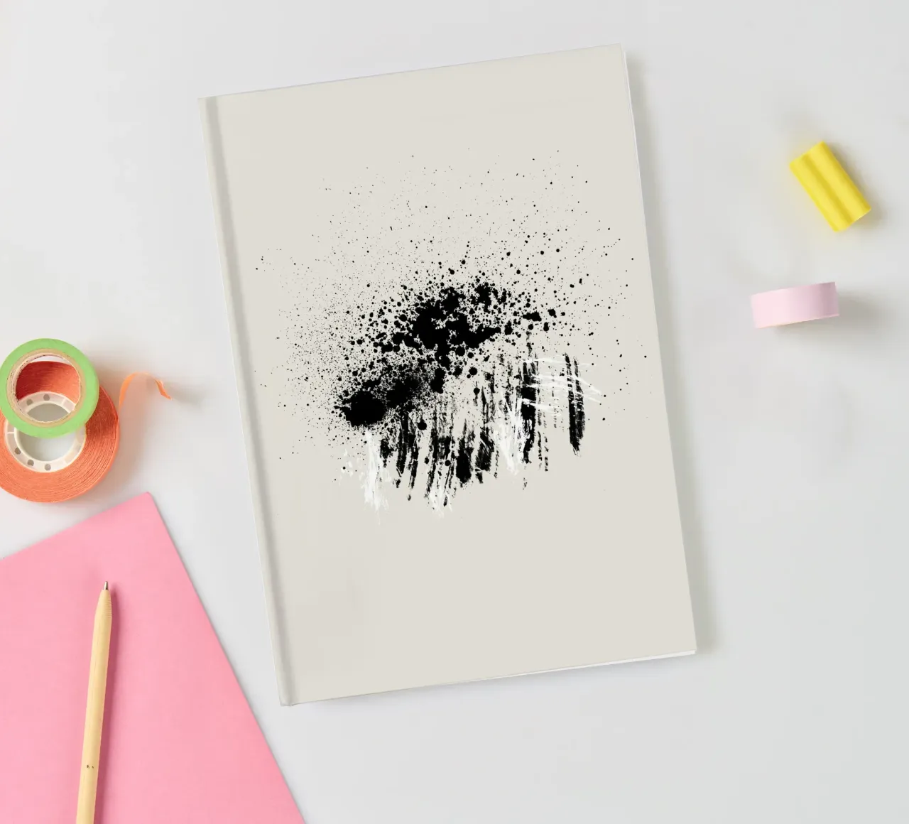 Paint splatters with shapes and lines in black and white Notizbuch von Imaginative