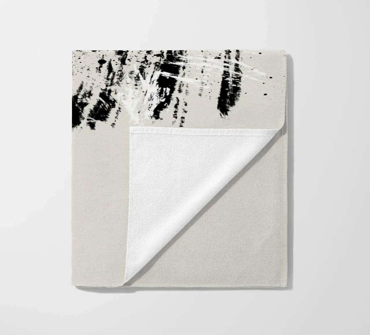 Paint splatters with shapes and lines in black and white Strandtuch von Imaginative