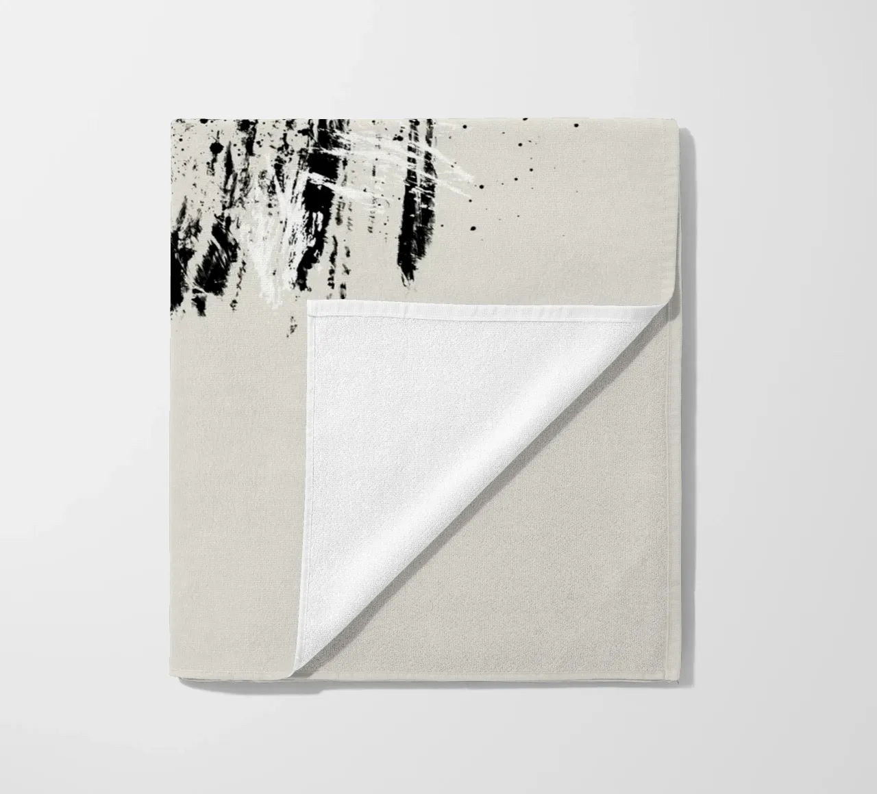 Paint splatters with shapes and lines in black and white Strandtuch von Imaginative
