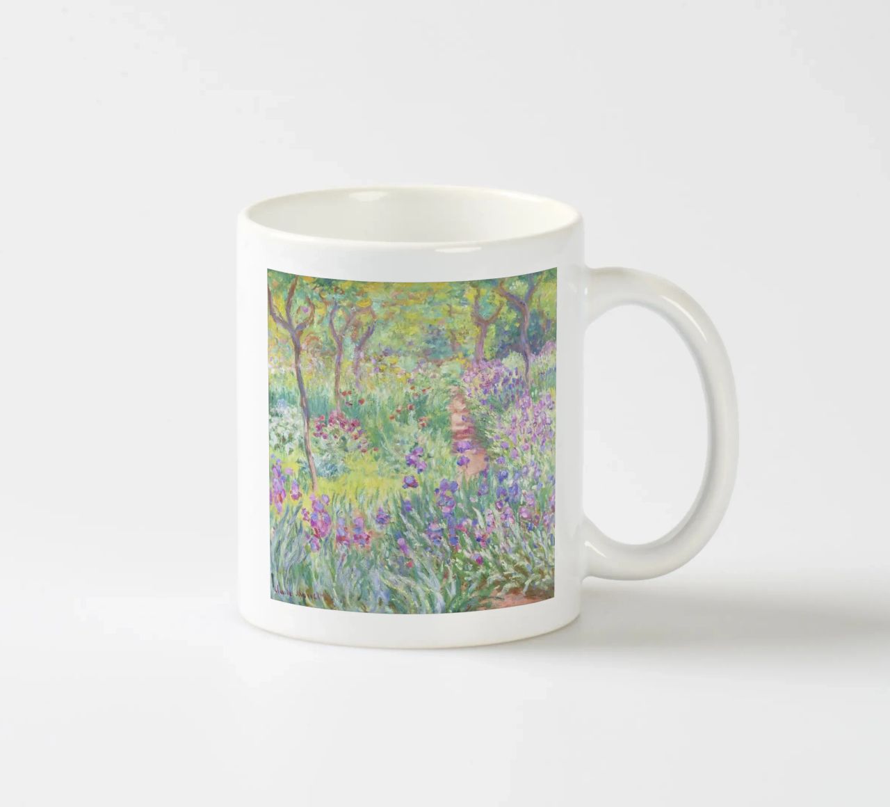 Der Garten des Künstlers in Giverny von Claude Monet Keramik Tasse von Venus Art