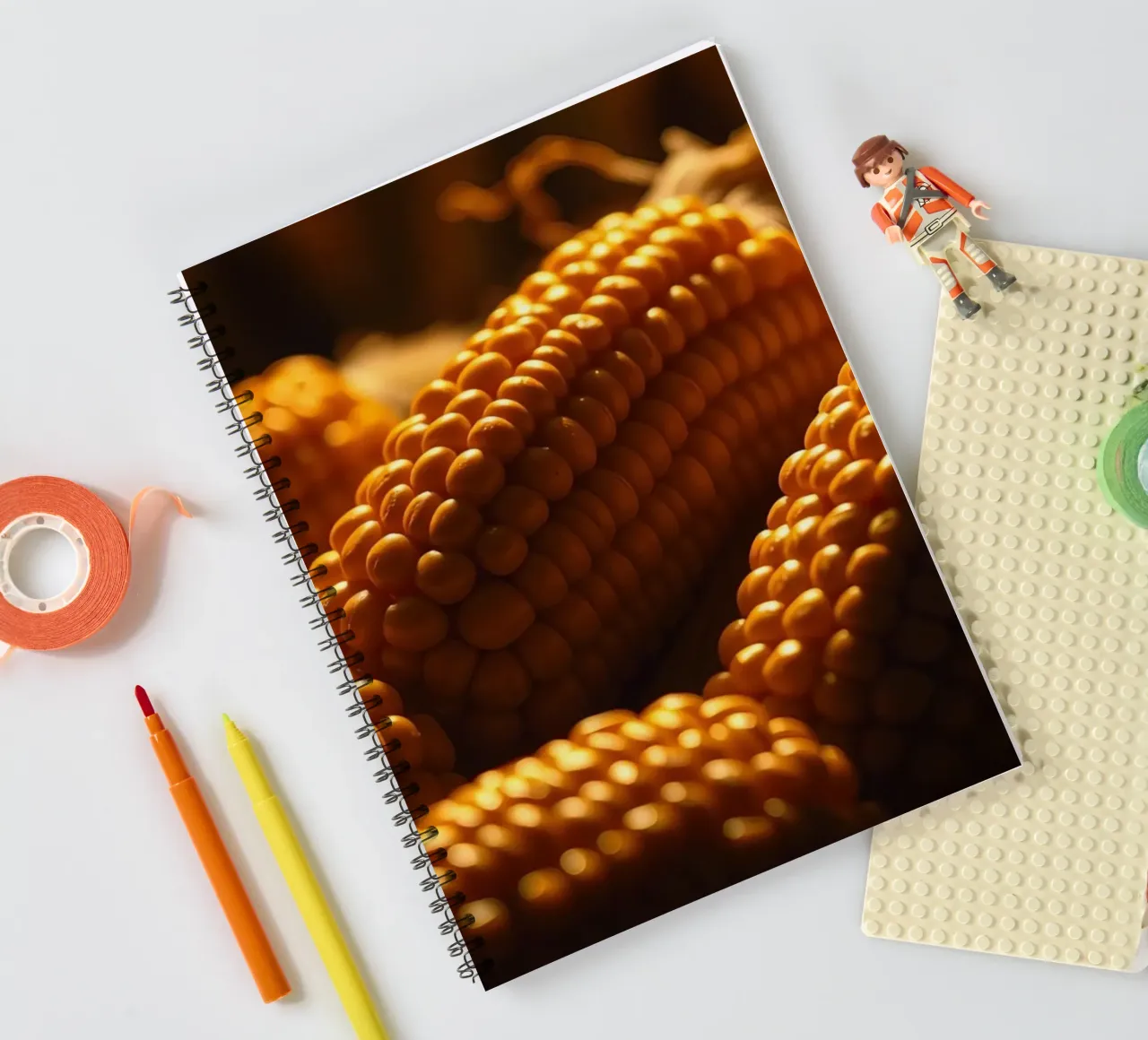Golden corn ears displayed in a rustic setting spiral notebook by DesignDoodle