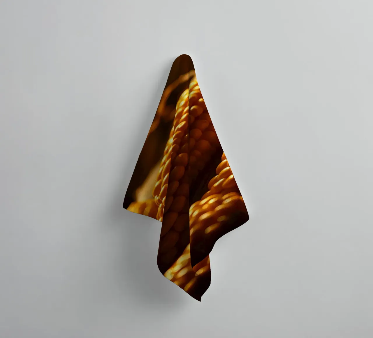 Golden corn ears displayed in a rustic setting towel by DesignDoodle