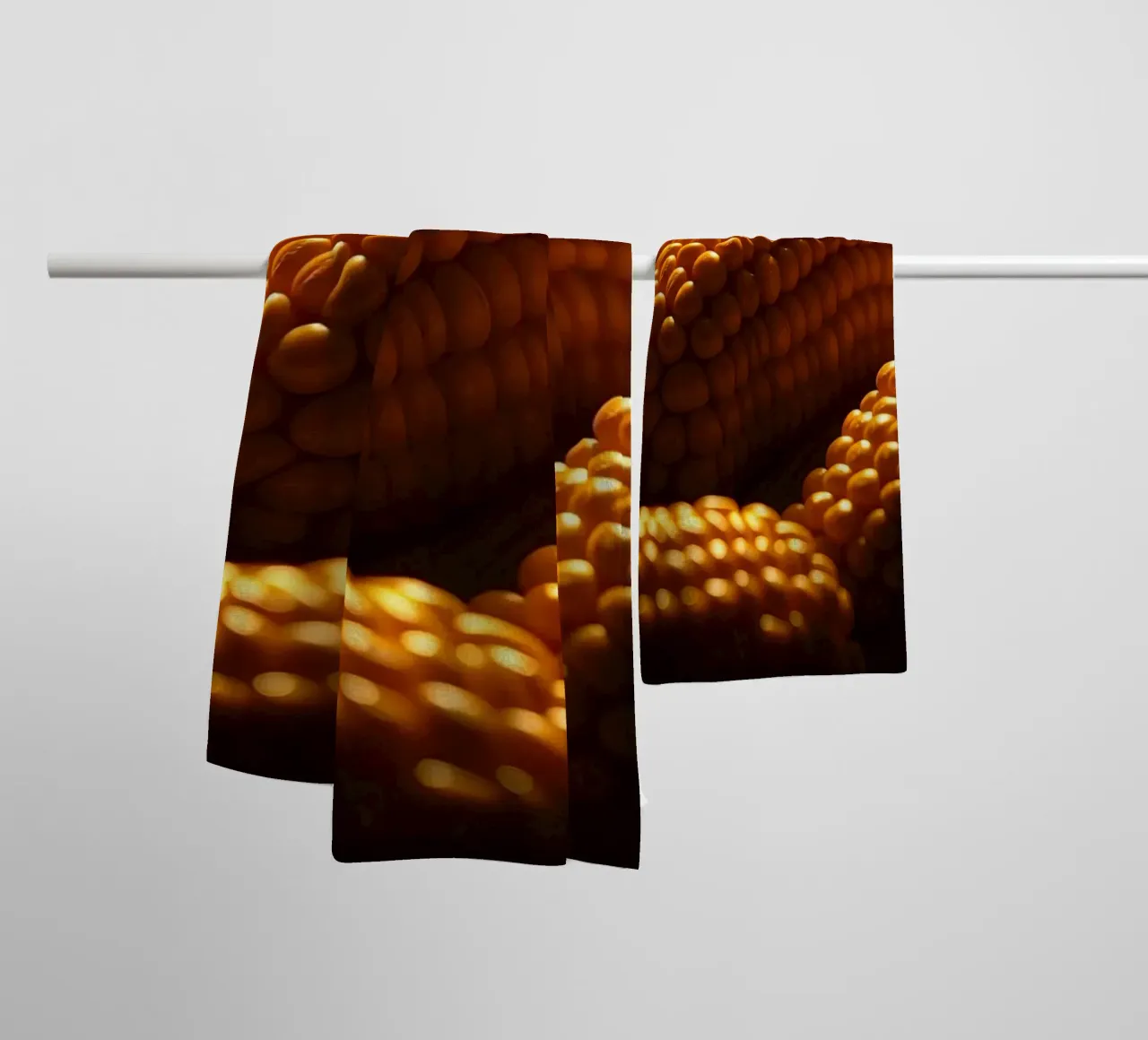 Golden corn ears displayed in a rustic setting towel by DesignDoodle