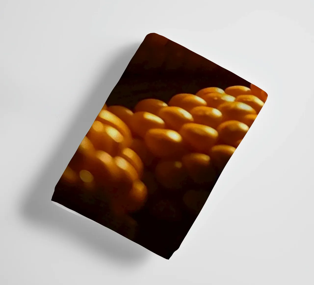 Golden corn ears displayed in a rustic setting towel by DesignDoodle