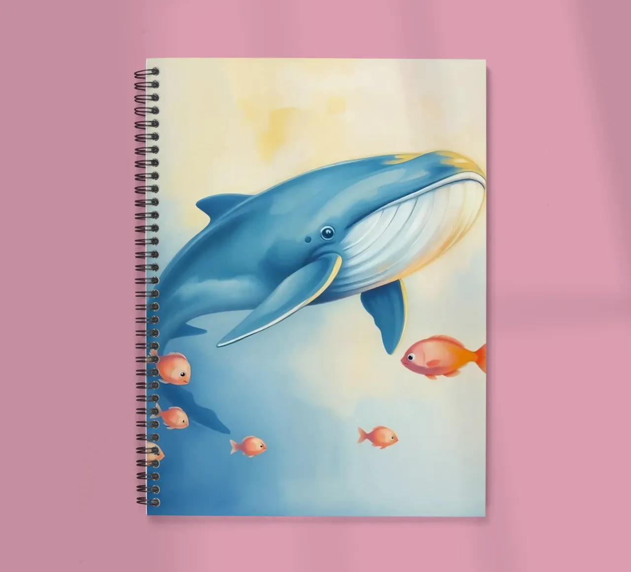 Whale swimming with small orange fish in a gentle underwater spiral notebook by DesignDoodle
