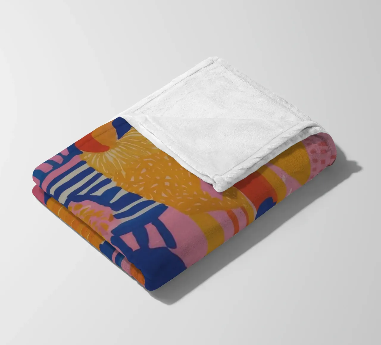 Patchwork geometrico pastello coperta in pile da Ember Stone