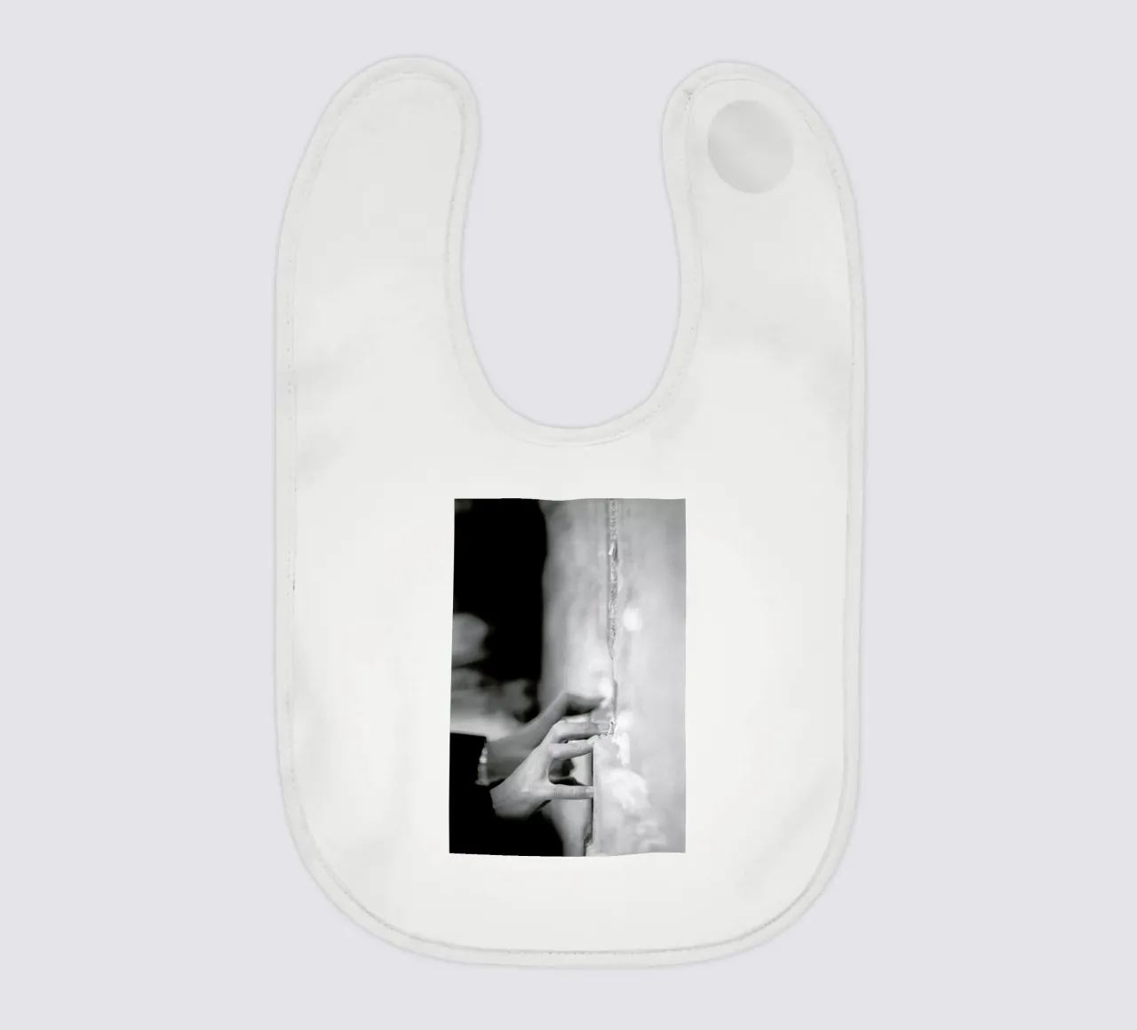 Prayer baby bib by Tal Paz-Fridman