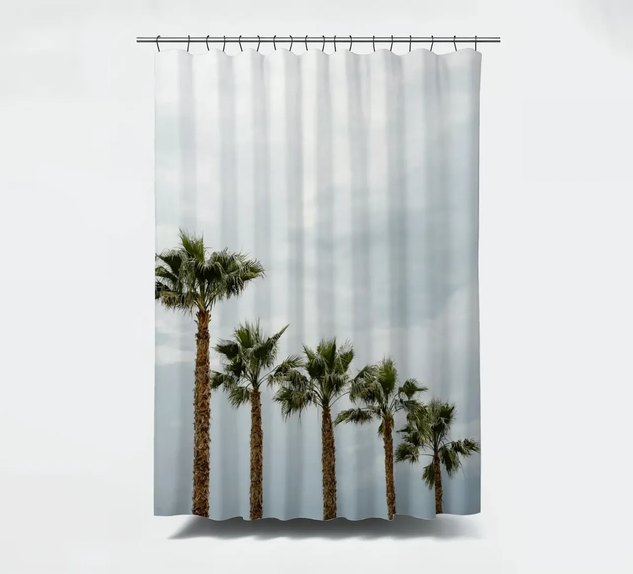 Palm trees in a row at the beach Duschvorhang von photolovers