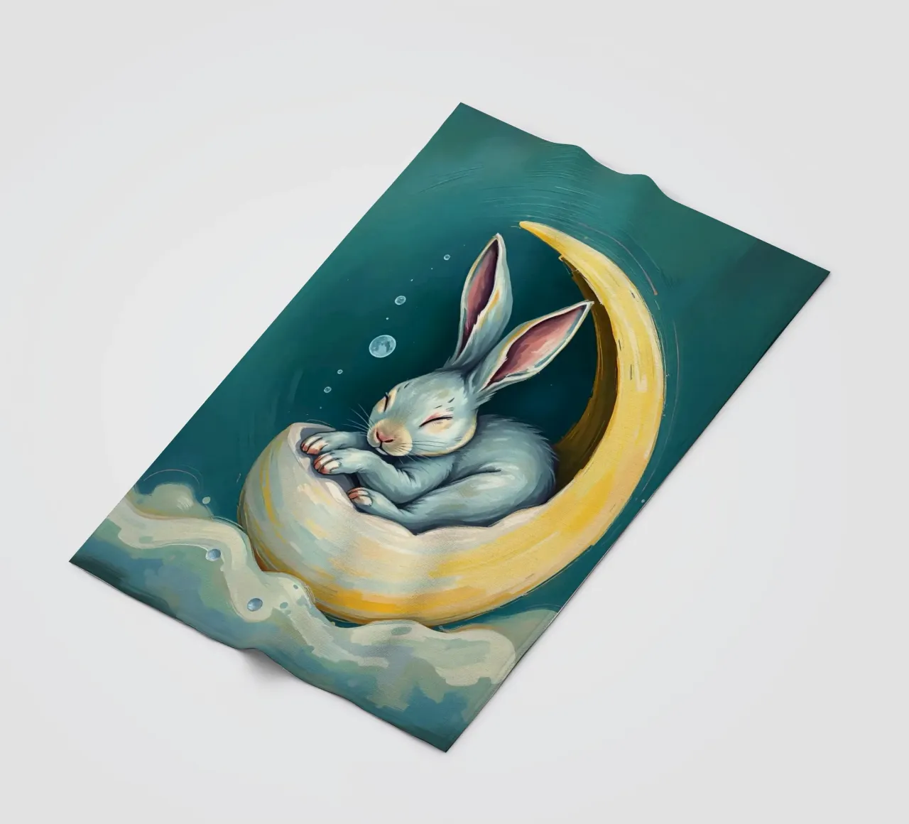 Sleeping bunny nestled in crescent moon with gentle clouds fleece blanket by DesignDoodle