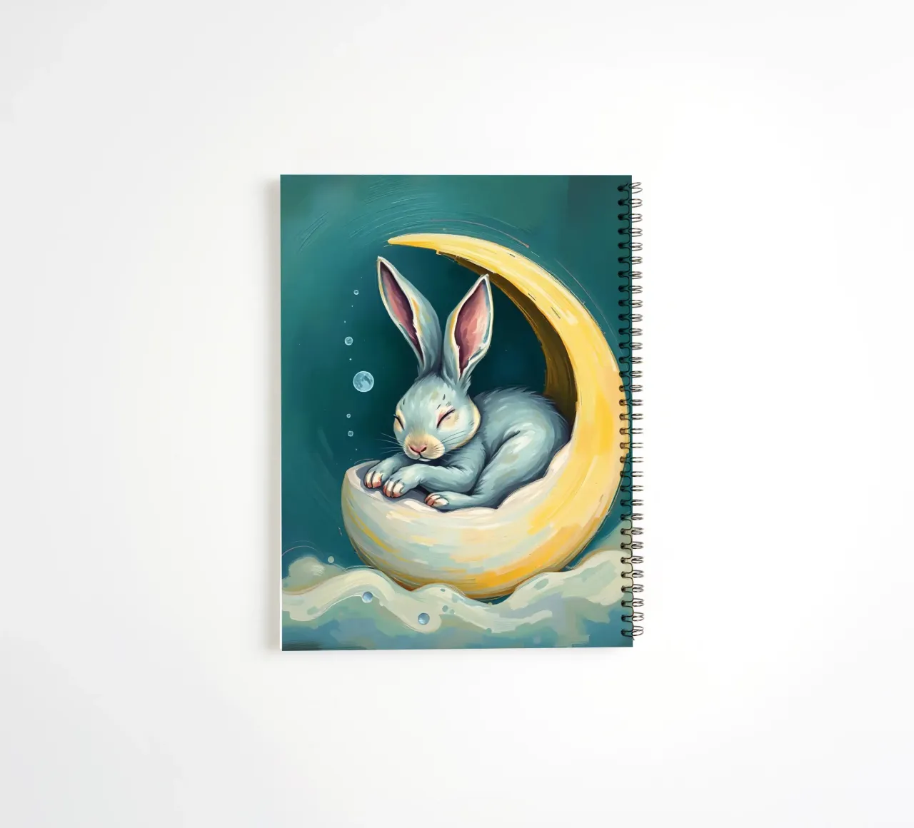 Sleeping bunny nestled in crescent moon with gentle clouds spiral notebook by DesignDoodle