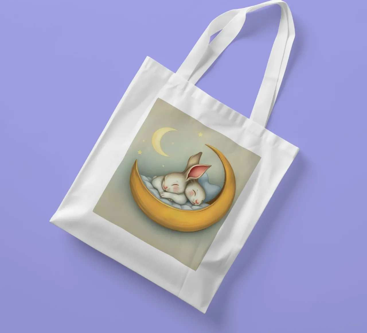 Due conigli che dormono tranquilli su una luna crescente borsa in juta da DesignDoodle