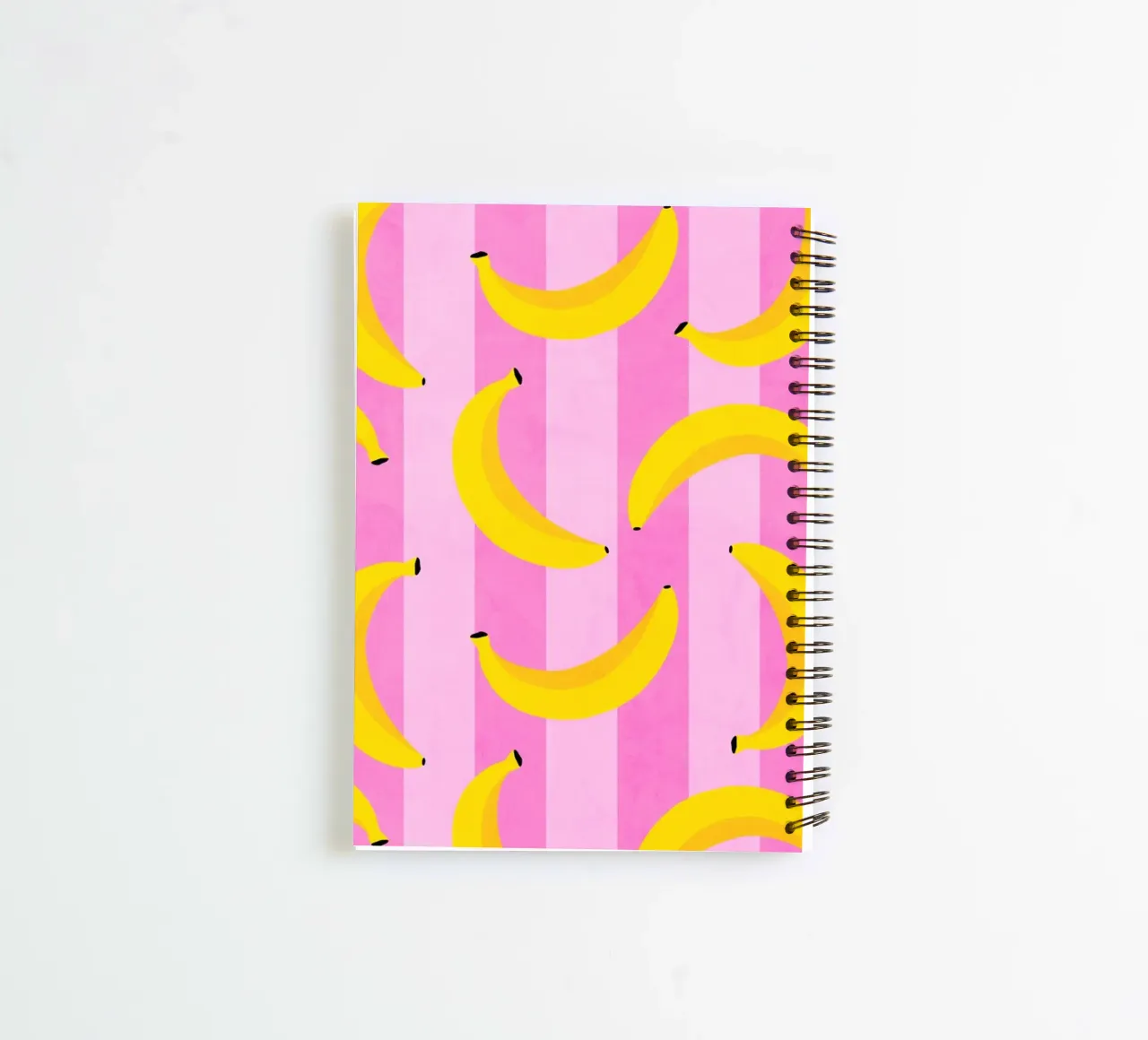 Neon Bananas Pattern on Pink Stripes spiral notebook by Dominique Vari