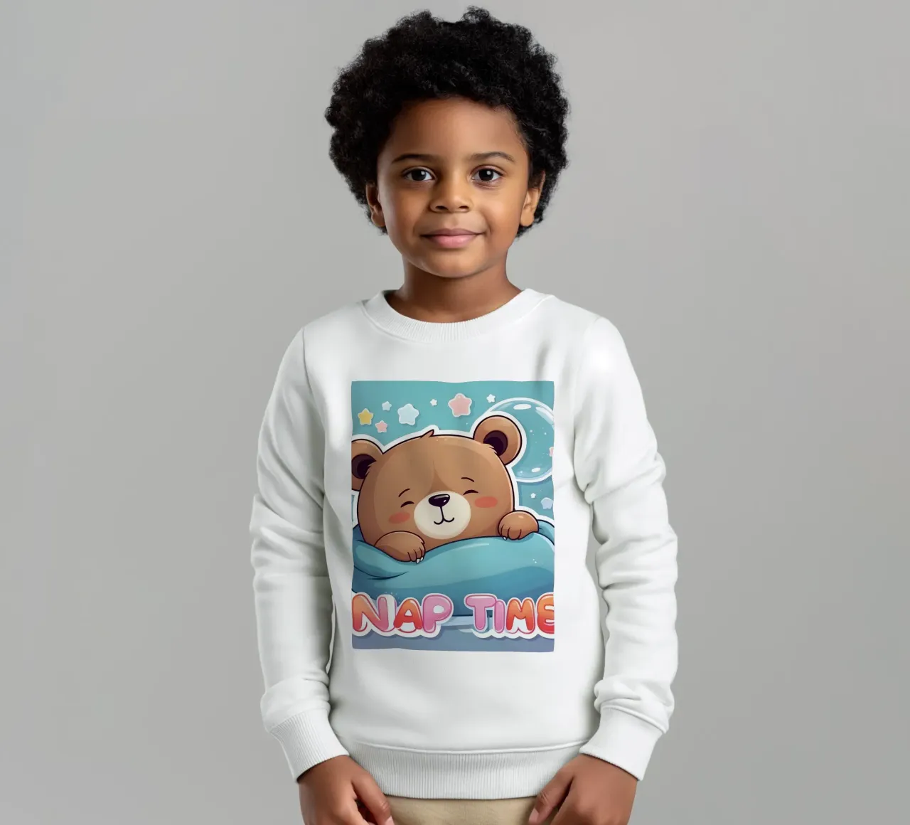 Simpatico orso dei cartoni animati che fa un pisolino in una coperta accogliente felpa bambino da DesignDoodle