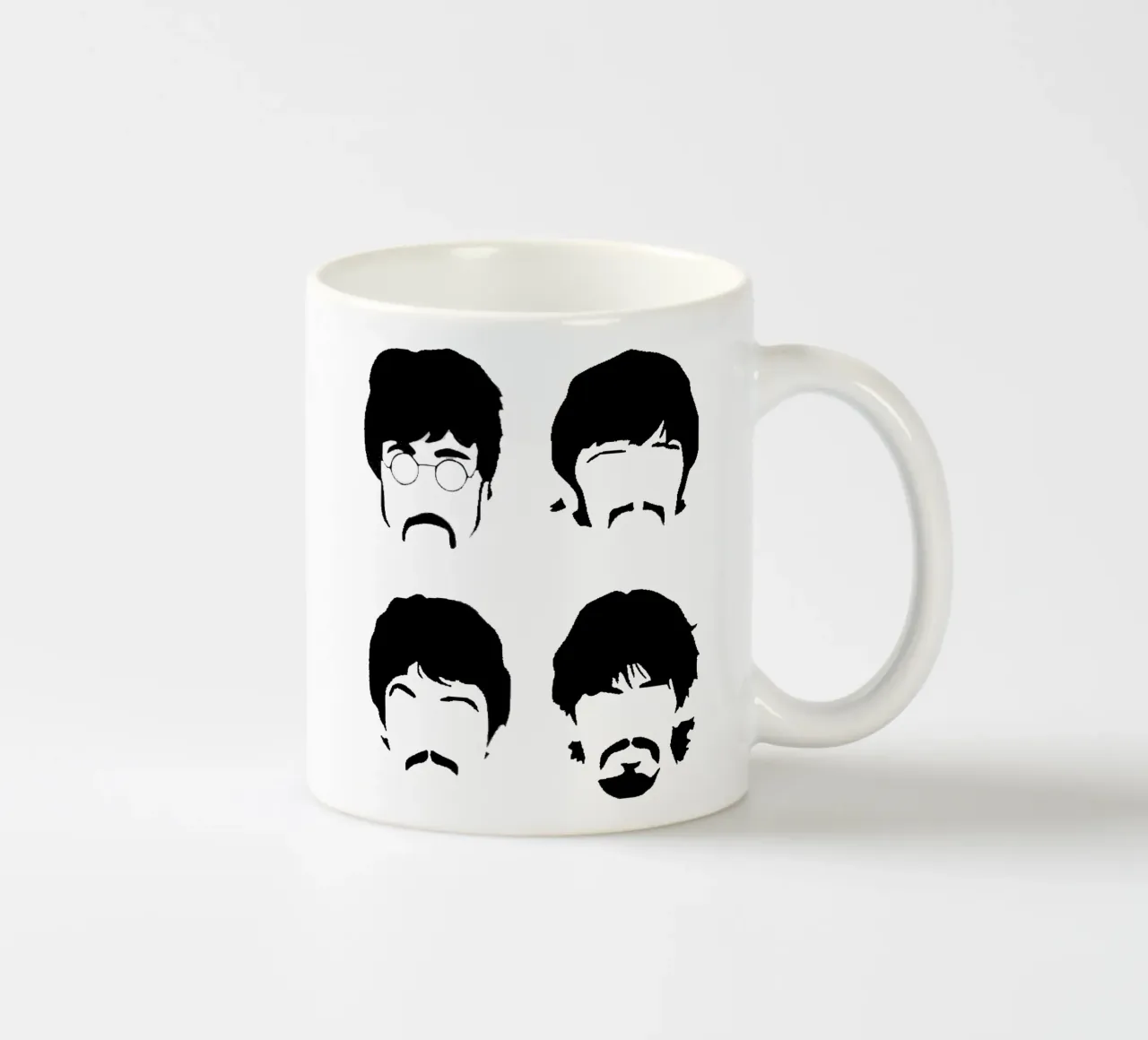 un gruppo di volti di uomini tazza in ceramica da vanessa shop